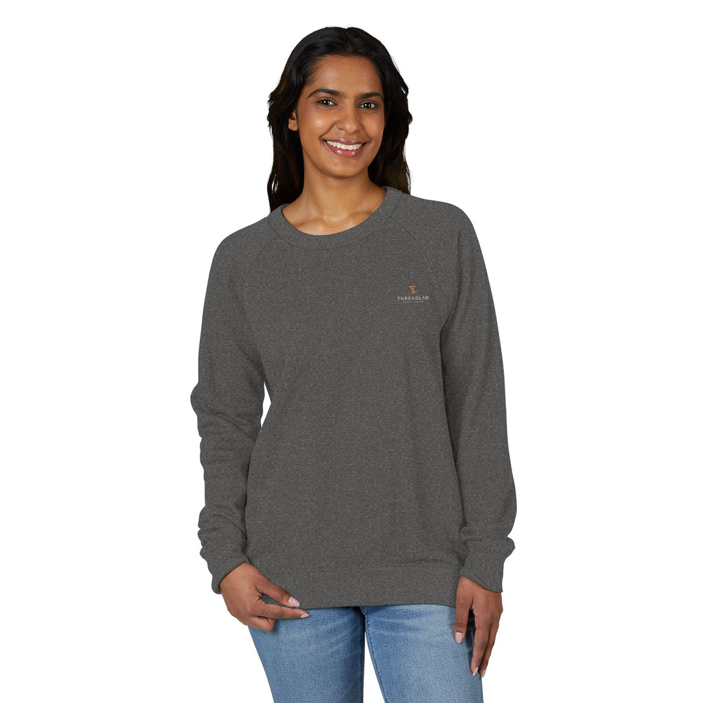 Crewneck Sweatshirt — Minimal Chest Logo Raglan French Terry by Printify